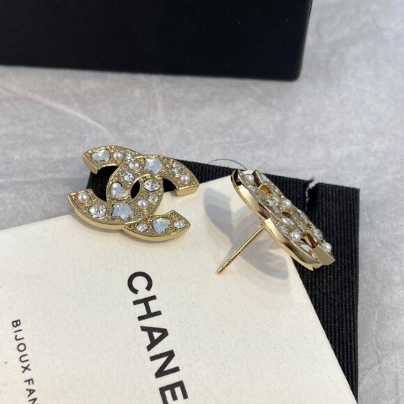 CHANEL Gold and Silver Star Crystal Earrings - Picture 1 of 5